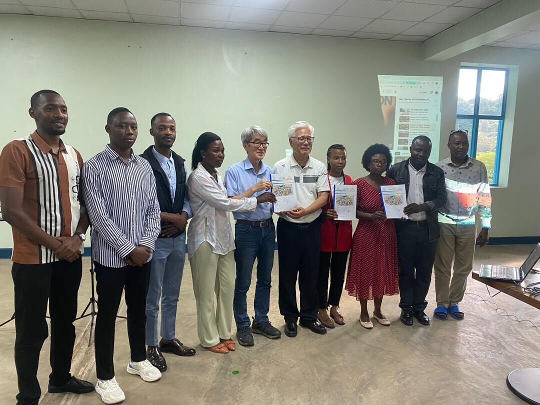 UAIT staff members with students after their internship presentation