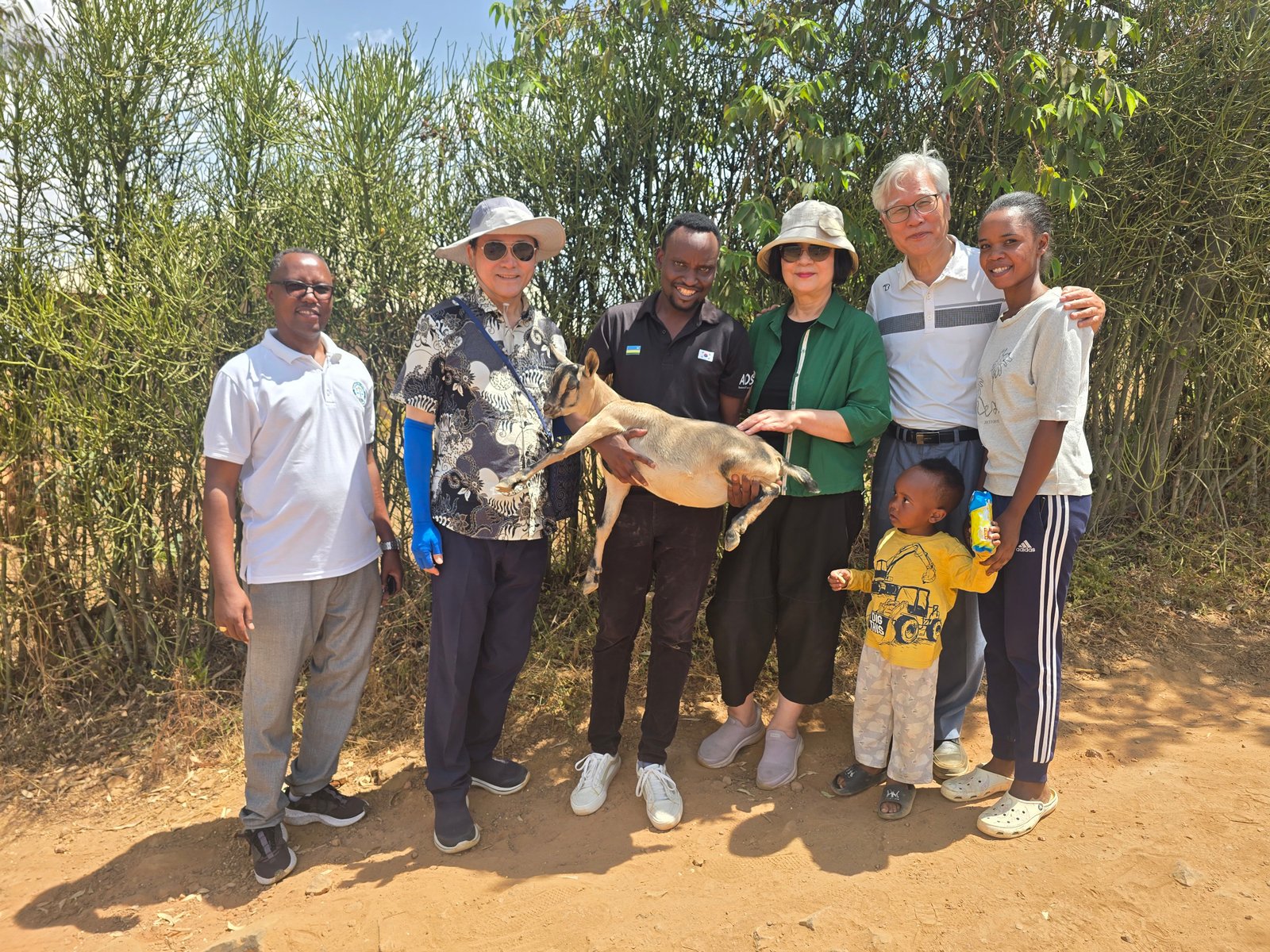 UAIT Vice Chancellor, Pastor Ryu Cheol-bae, his wife, Eric, and members of the Bugesera campus community with a goat