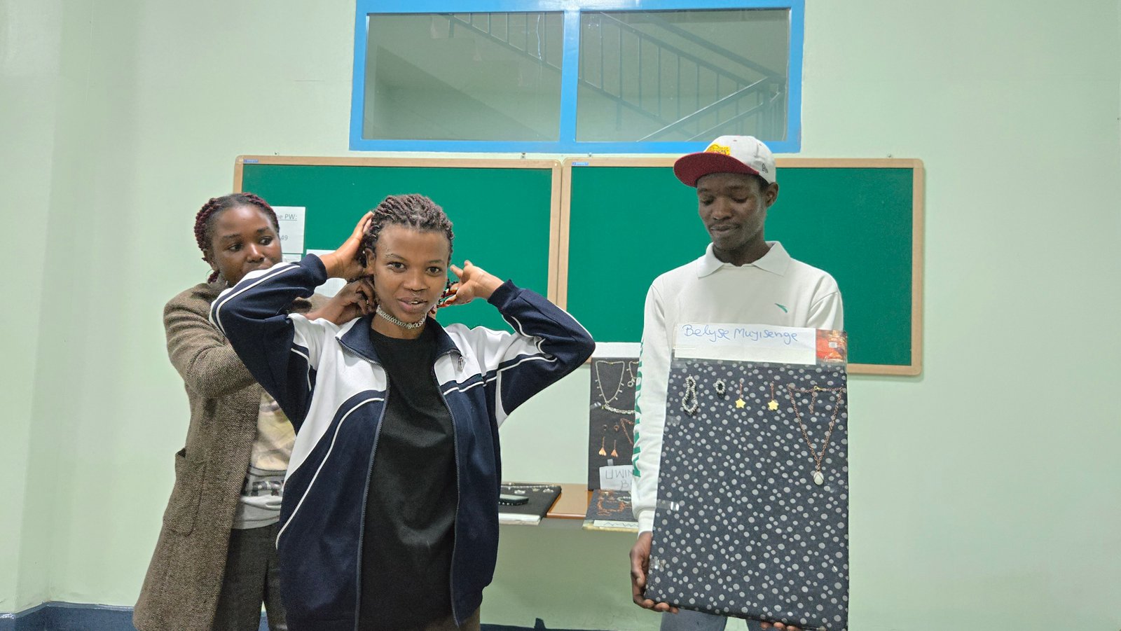 Student trying on jewelry piece