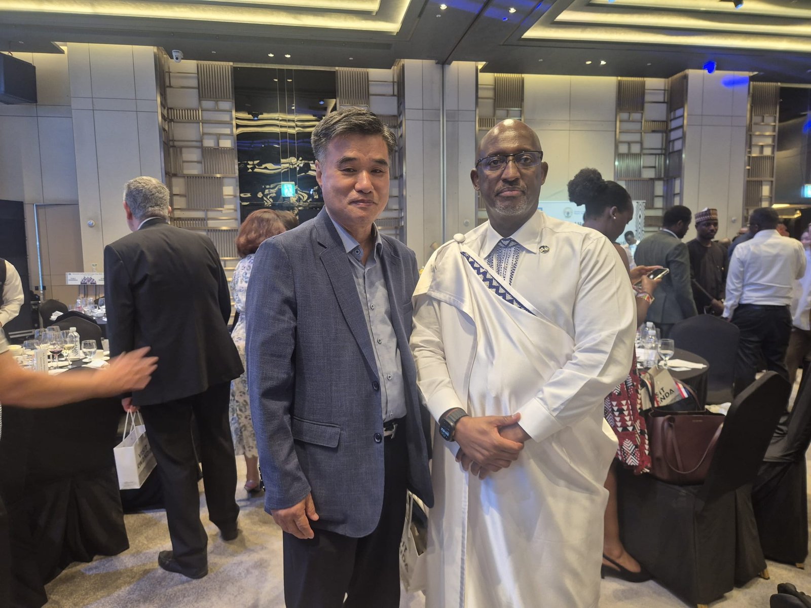 UAIT faculty member with a guest during Rwanda Cultural Heritage Day 2026